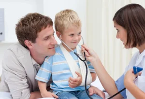 Doctor with a young child, technical support